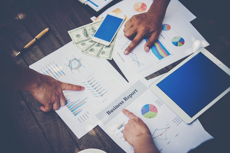 group of business people analysis with marketing report graph, y